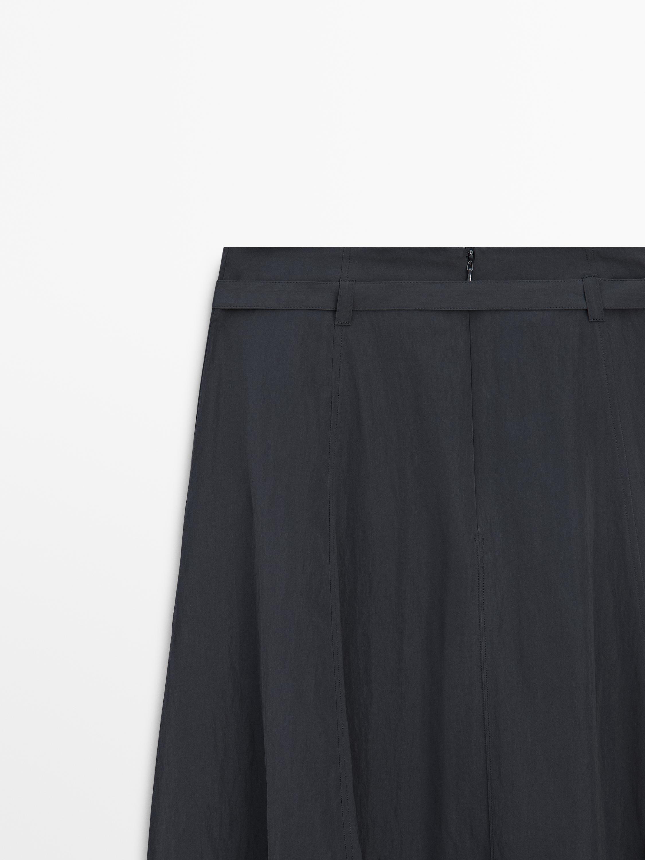 Long skirt with belt detail